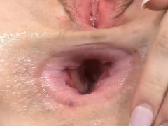 Lovesome sweetie is gaping soft vagina in close-up and havin